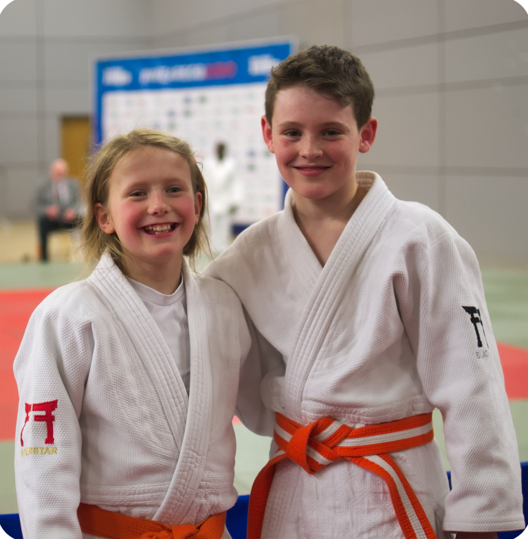 Young judo friends at competition